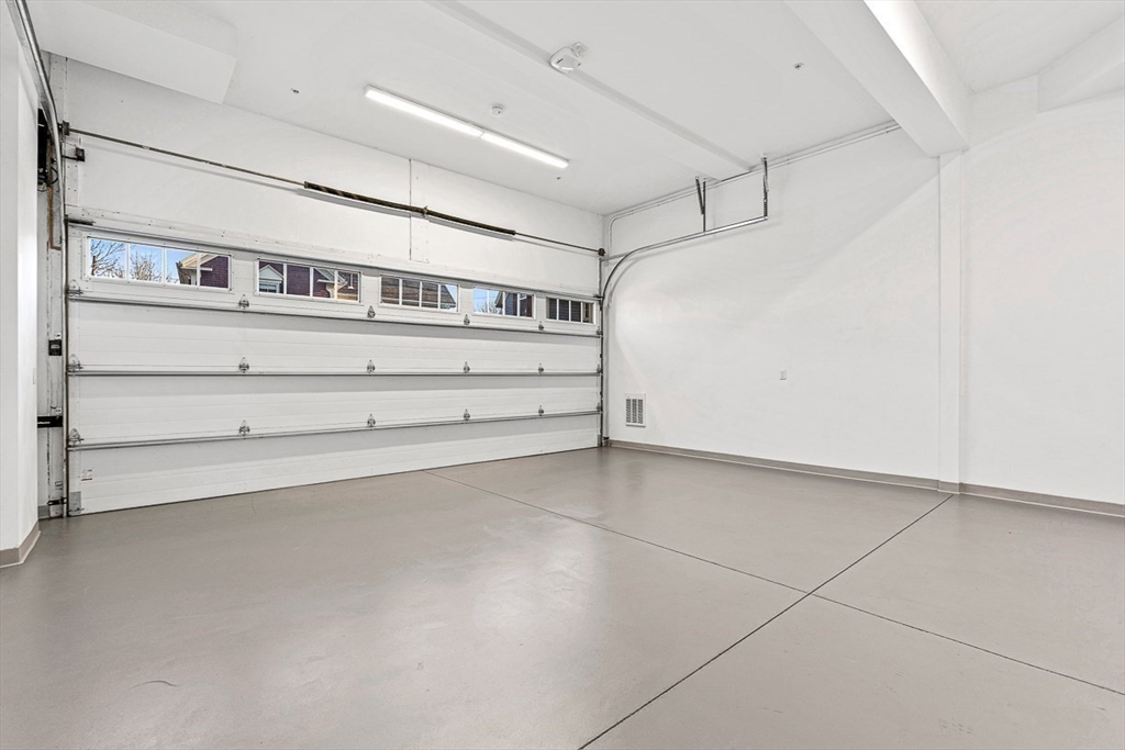 846 Main Street, Unit 3 Winchester, MA 01890 - Photo 35 of 36 a view of walk in closet with empty racks