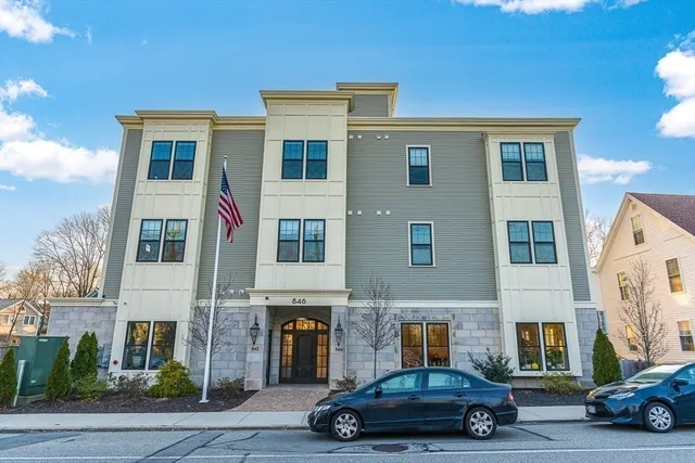 a car parked in front of a building