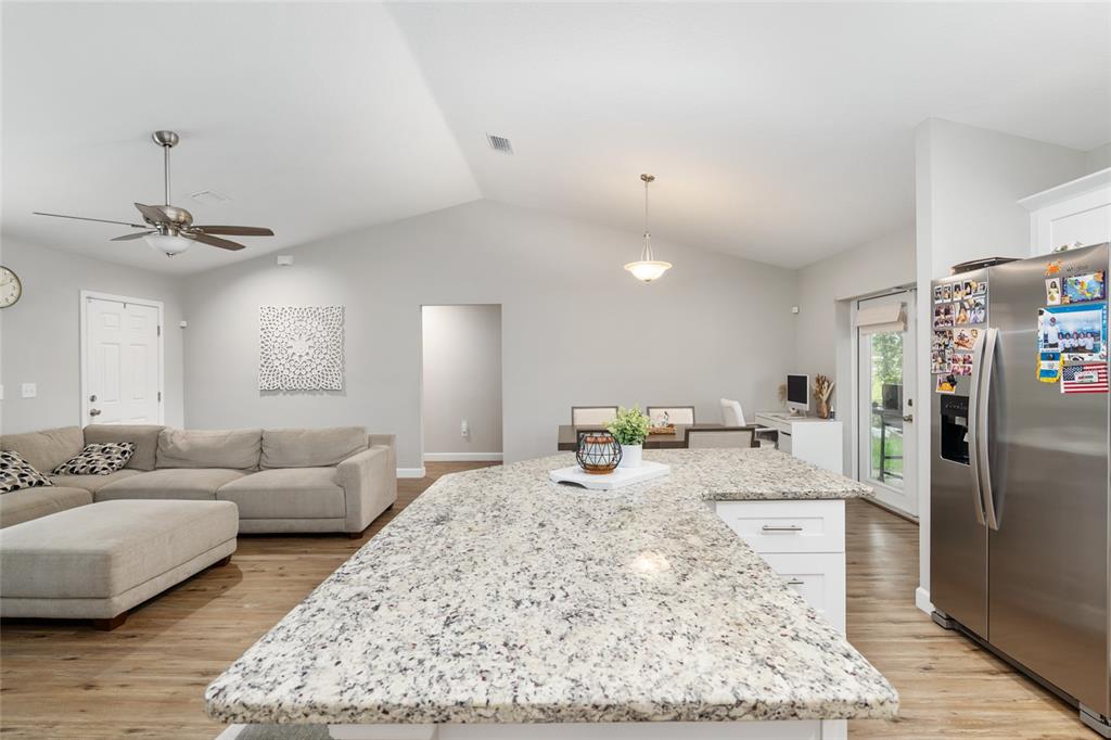 12 Oak Circle Pass Ocala, FL 34472 - Photo 23 of 50 a living room with furniture and a rug