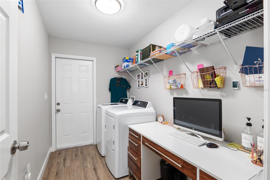 12 Oak Circle Pass Ocala, FL 34472 - Photo 37 of 50 a view of storage and utility room with a washer and dryer