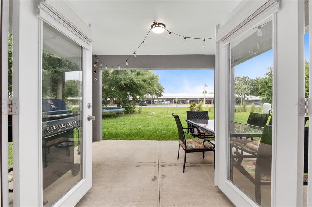 12 Oak Circle Pass Ocala, FL 34472 - Photo 39 of 50 a view of a porch with furniture and garden