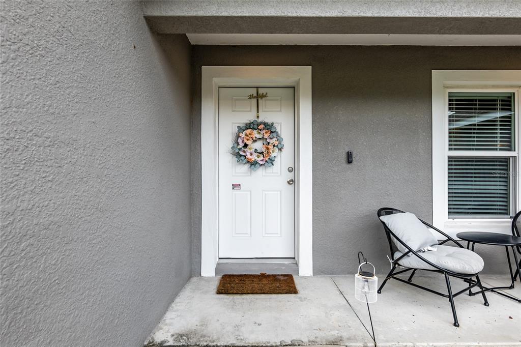 12 Oak Circle Pass Ocala, FL 34472 - Photo 4 of 50 a hallway with a desk and a chair