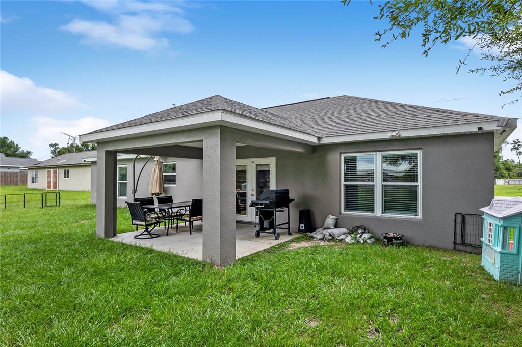 12 Oak Circle Pass Ocala, FL 34472 - Photo 43 of 50 a view of house with a yard