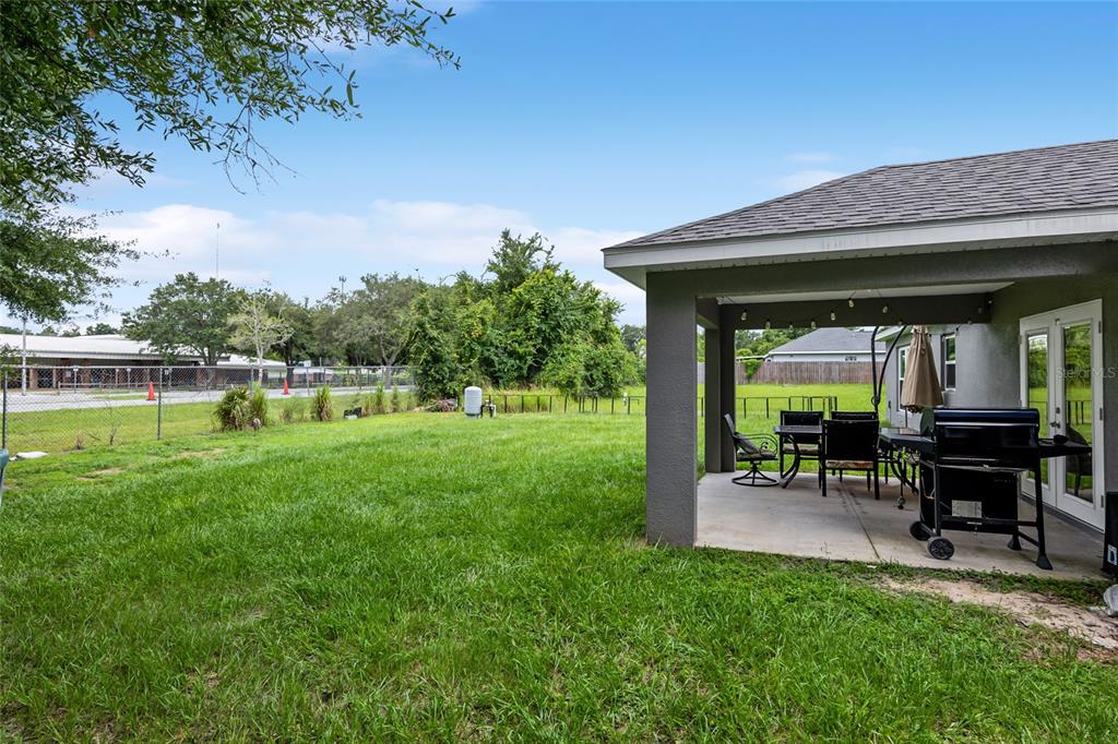 12 Oak Circle Pass Ocala, FL 34472 - Photo 44 of 50 a view of a chairs and table in the garden