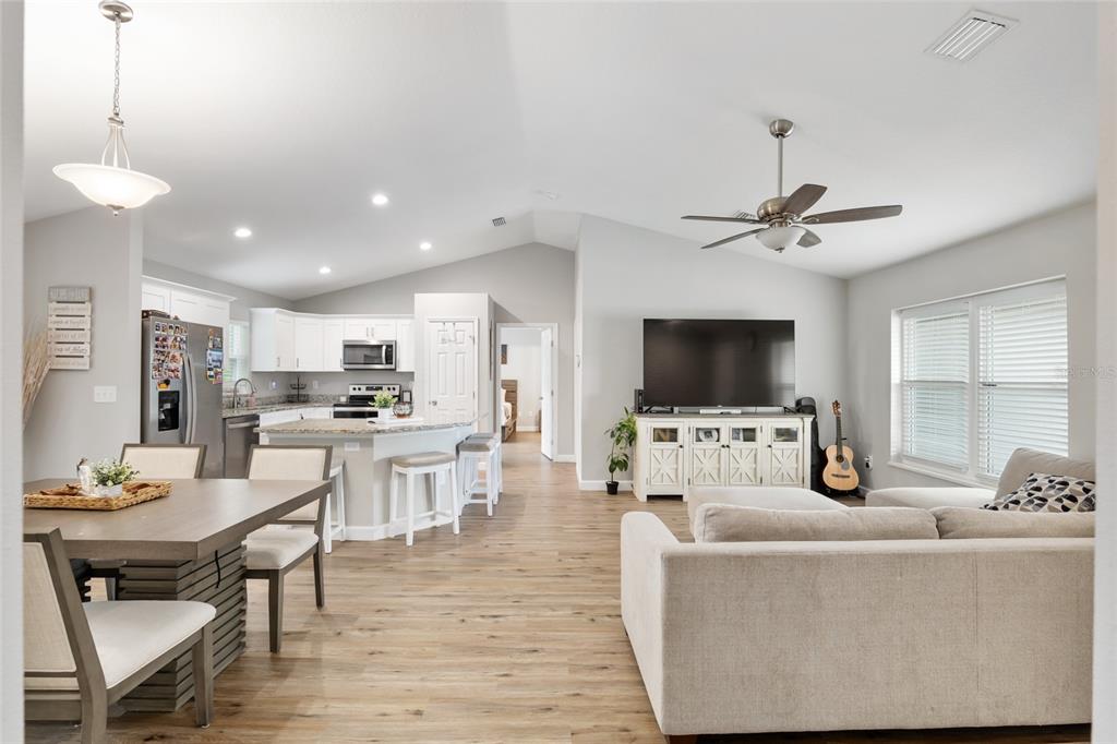 12 Oak Circle Pass Ocala, FL 34472 - Photo 8 of 50 a living room with furniture and a flat screen tv