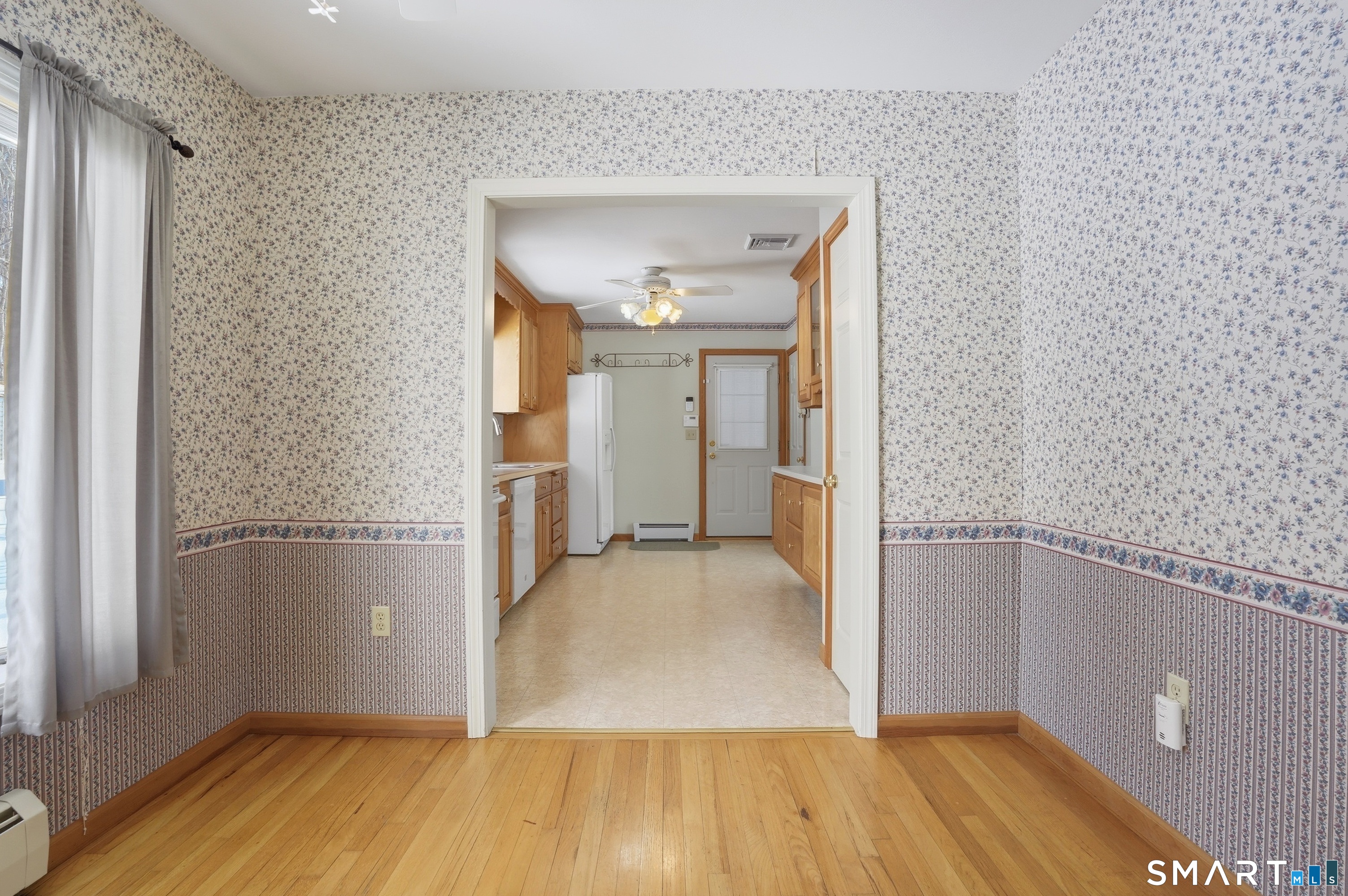 36 Longview Terrace Naugatuck, CT 06770 - Photo 11 of 29 a view of a hallway with wooden floor and staircase