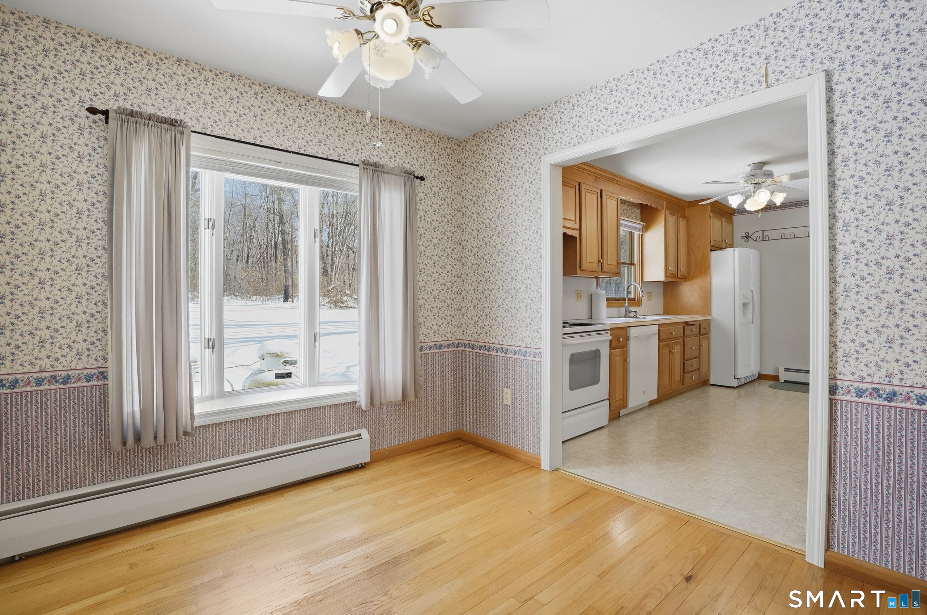 36 Longview Terrace Naugatuck, CT 06770 - Photo 12 of 29 a view of a kitchen with wooden floor electronic appliances and windows