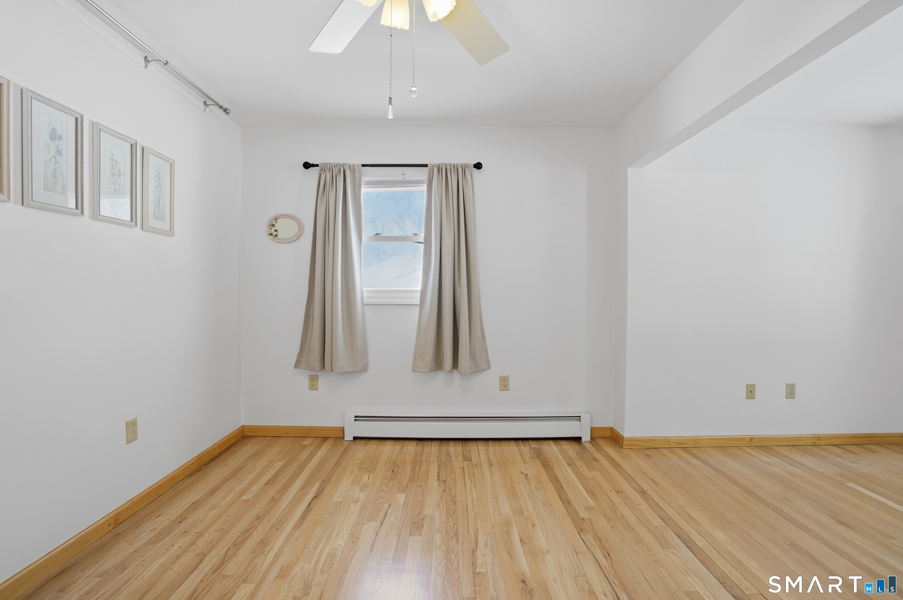 36 Longview Terrace Naugatuck, CT 06770 - Photo 20 of 29 an empty room with wooden floor and door