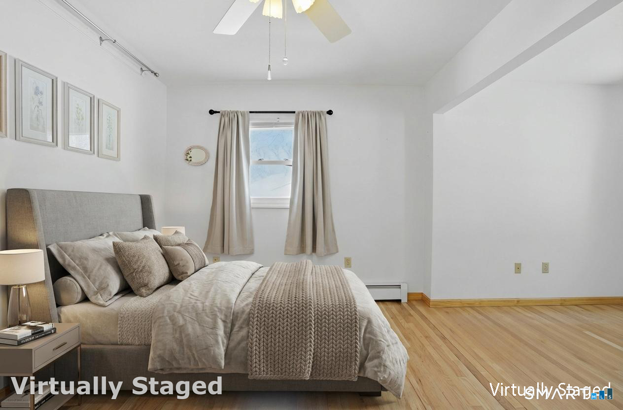 36 Longview Terrace Naugatuck, CT 06770 - Photo 21 of 29 a bedroom with a bed and a night stand