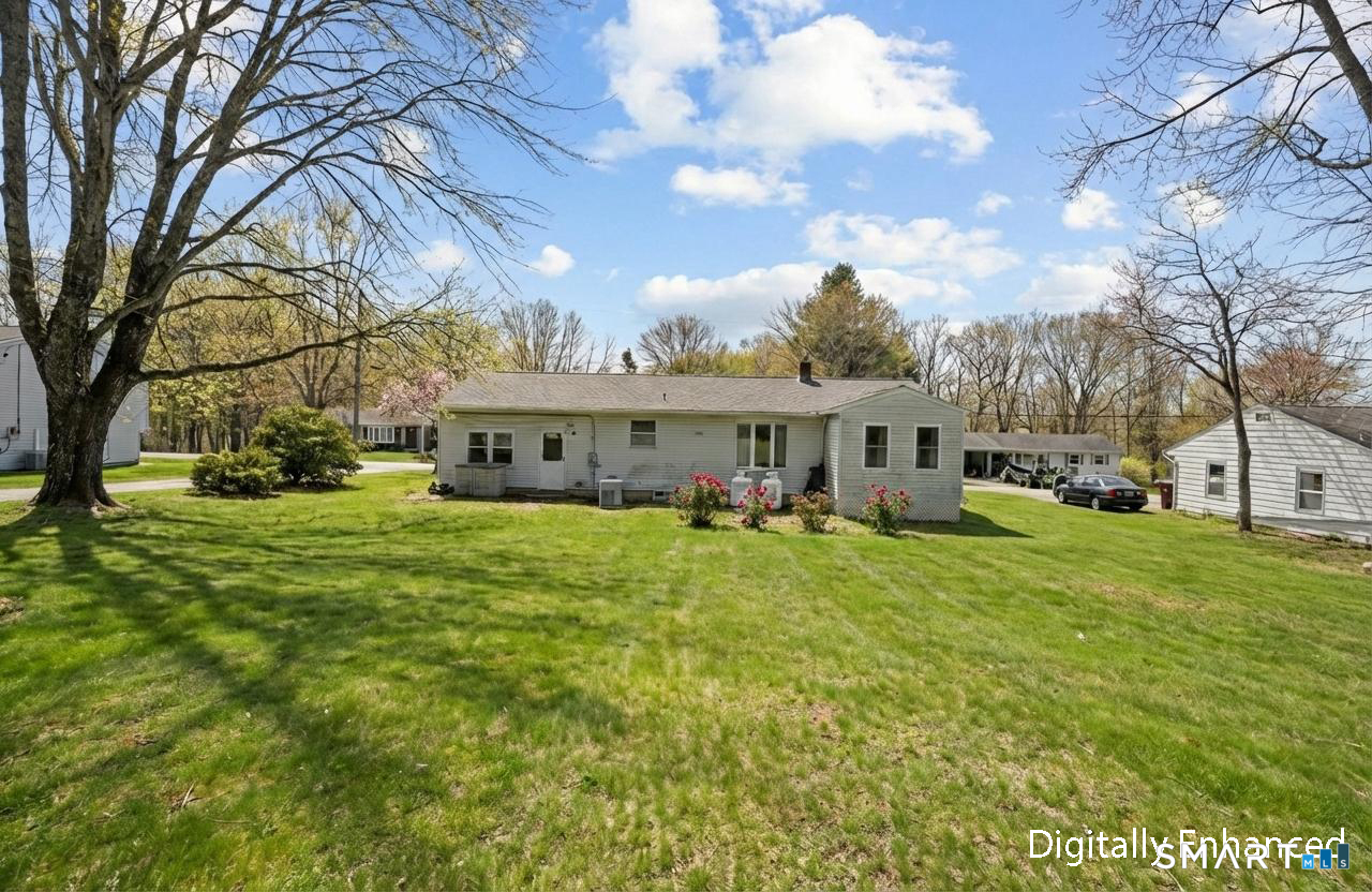 36 Longview Terrace Naugatuck, CT 06770 - Photo 26 of 29 a front view of house with yard and green space