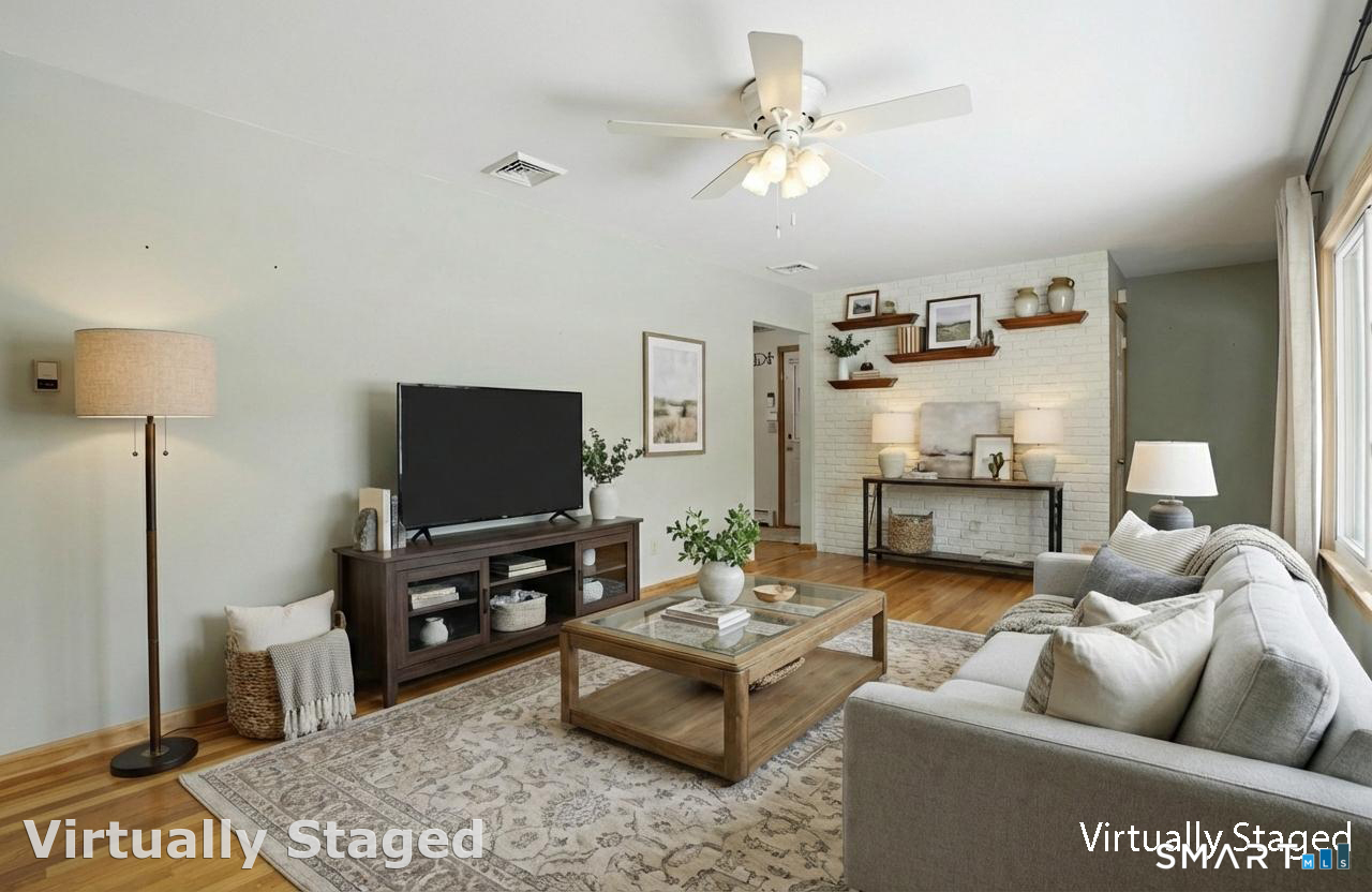 36 Longview Terrace Naugatuck, CT 06770 - Photo 4 of 29 a living room with furniture and a flat screen tv