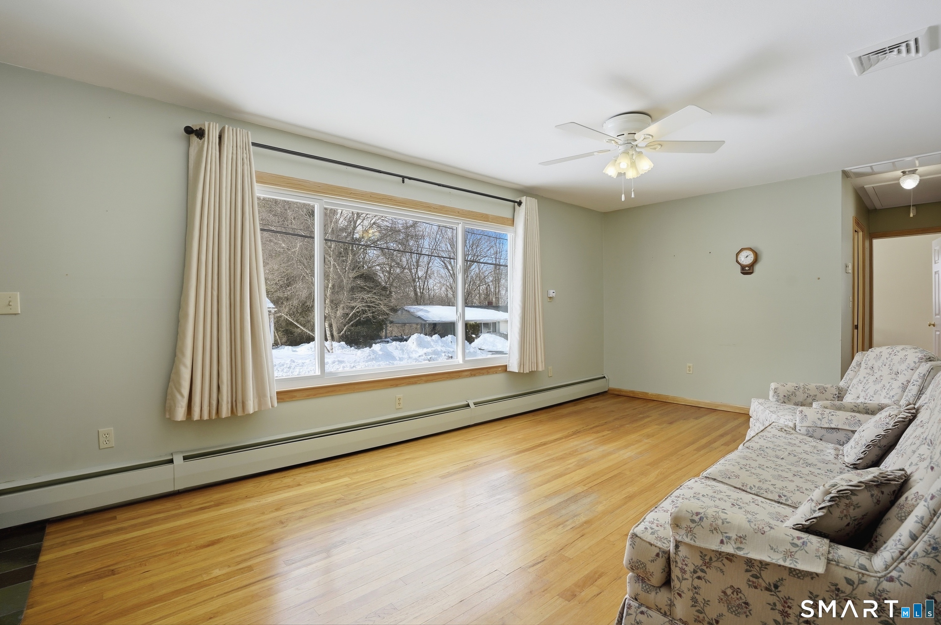 36 Longview Terrace Naugatuck, CT 06770 - Photo 6 of 29 a view of livingroom with furniture wooden floor and fan