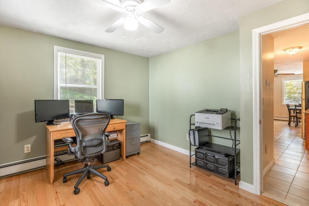 172 Virginia Road Waltham, MA 02453 - Photo 16 of 26 a view of a workspace with furniture and a window
