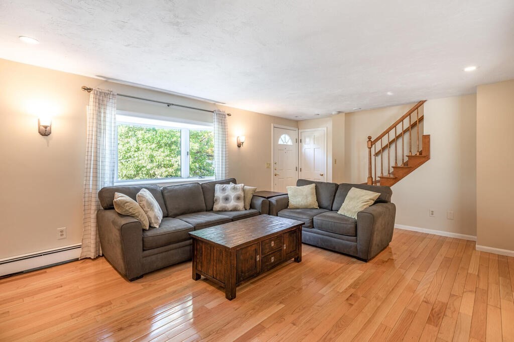 172 Virginia Road Waltham, MA 02453 - Photo 6 of 26 a living room with furniture and a window