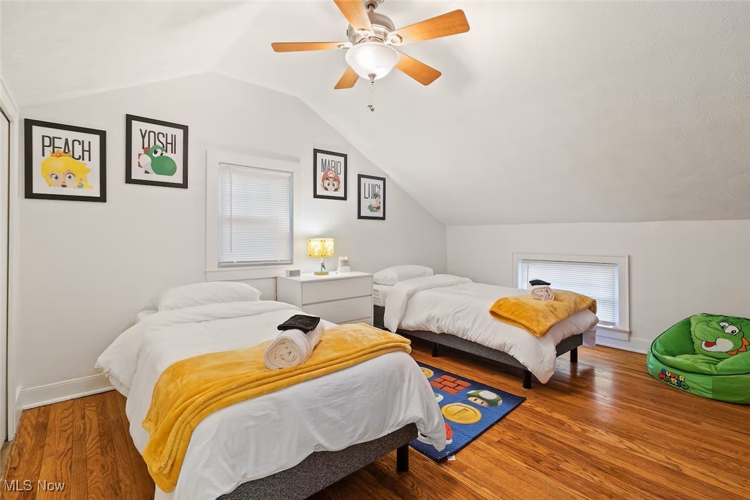 47 Prospect Road Berea, OH 44017 - Photo 21 of 23 Bedroom featuring lofted ceiling, wood finished floors, and a ceiling fan