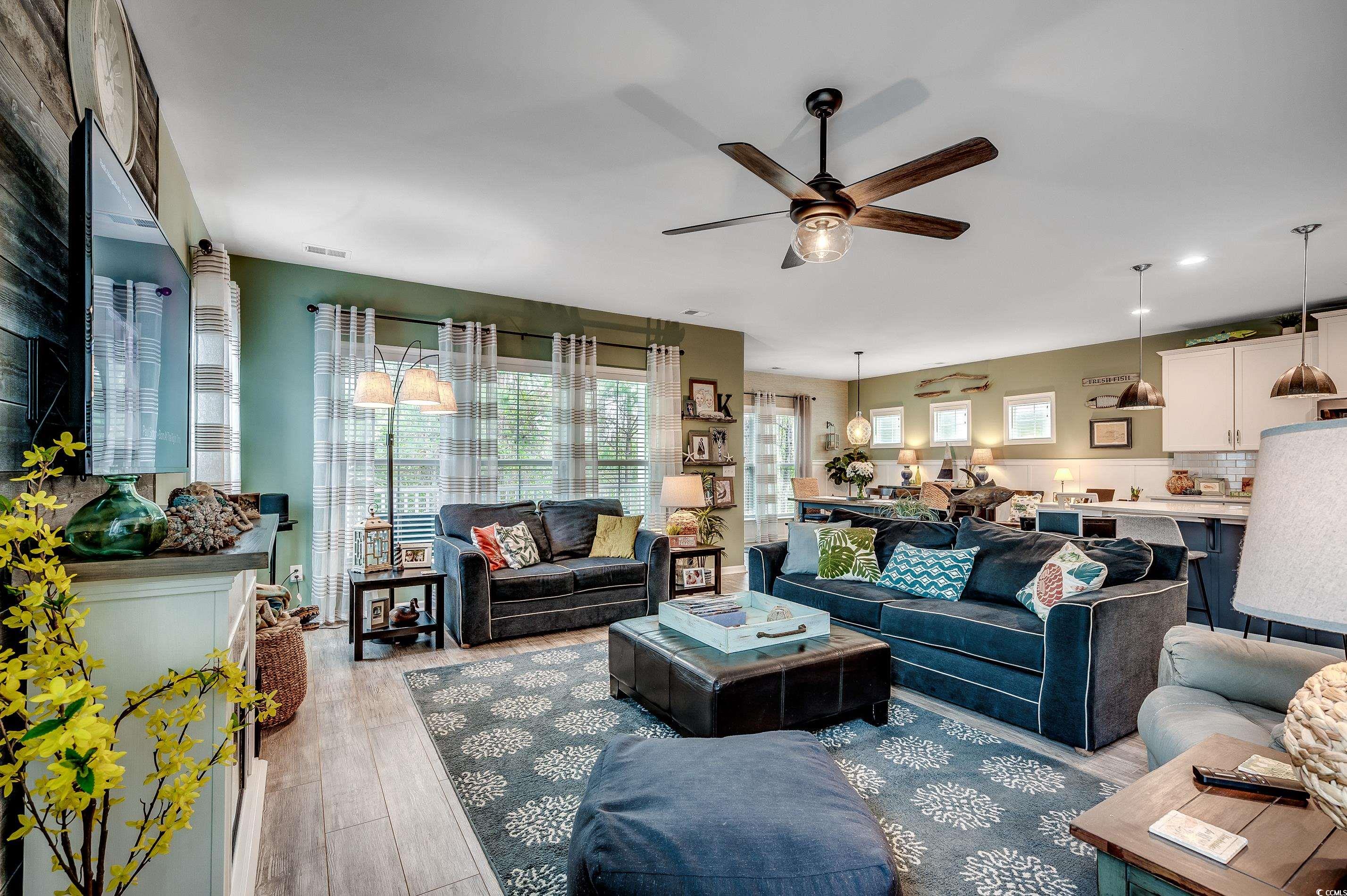 205 Splendor Circle Murrells Inlet, SC 29576 - Photo 12 of 40 Living room featuring light wood finished floors,