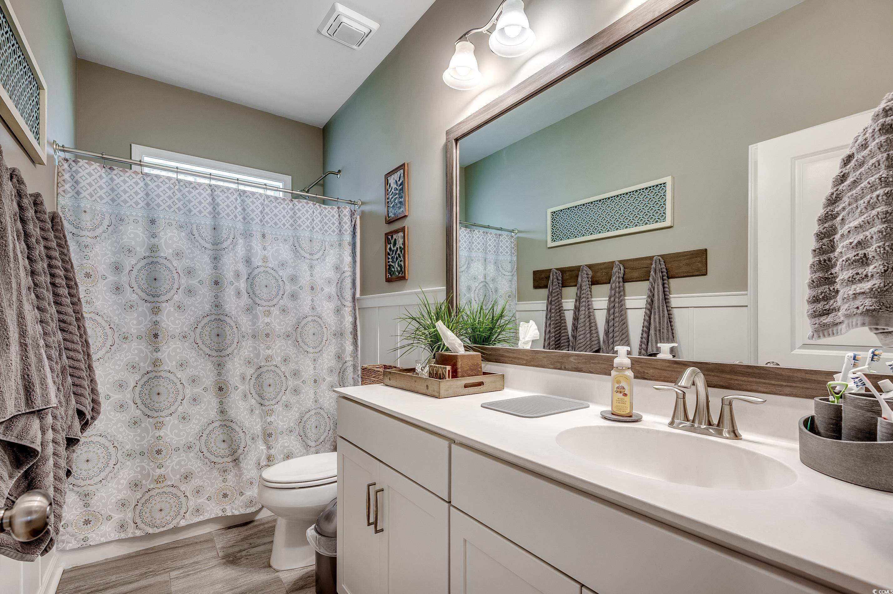 205 Splendor Circle Murrells Inlet, SC 29576 - Photo 28 of 40 Bathroom featuring visible vents, a shower with sh
