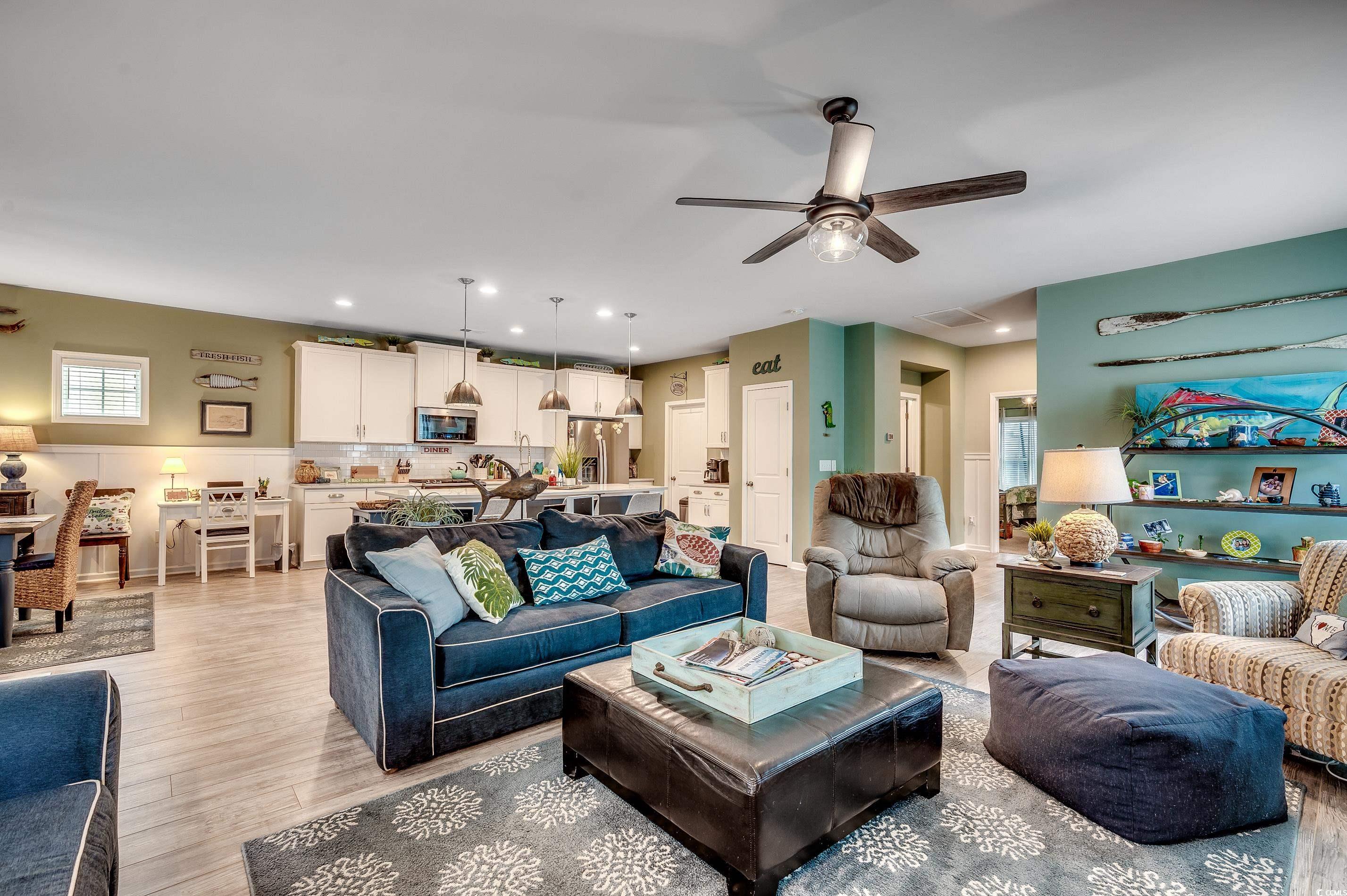 205 Splendor Circle Murrells Inlet, SC 29576 - Photo 4 of 40 Living room featuring a ceiling fan, visible vents