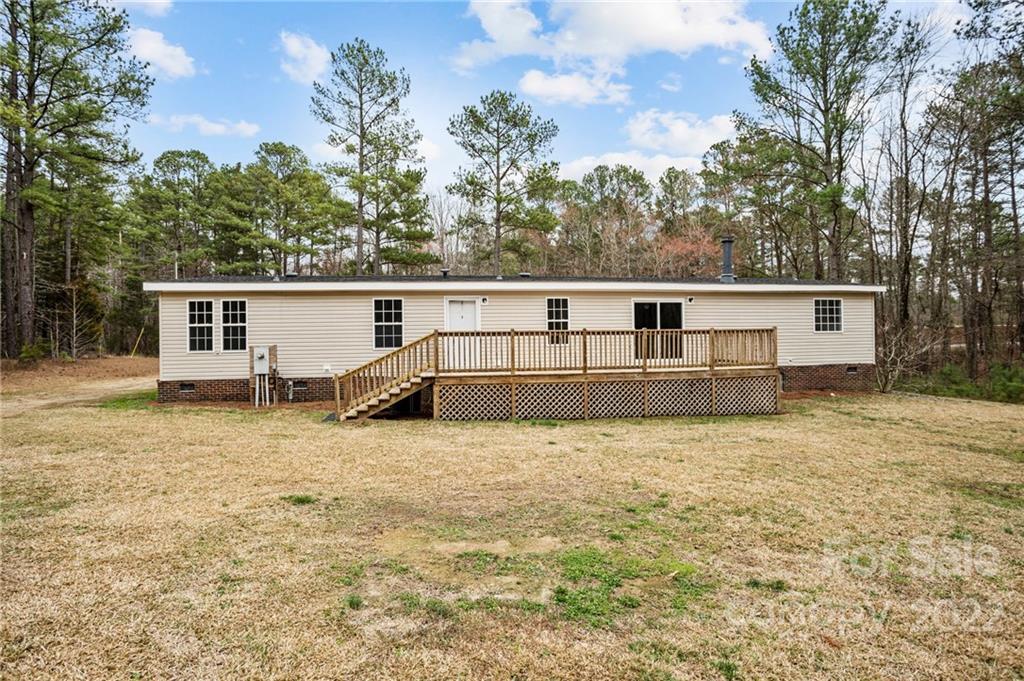 3205 Unity Church Road Lancaster, SC 29720 - Photo 29 of 45 a view of house with backyard and deck
