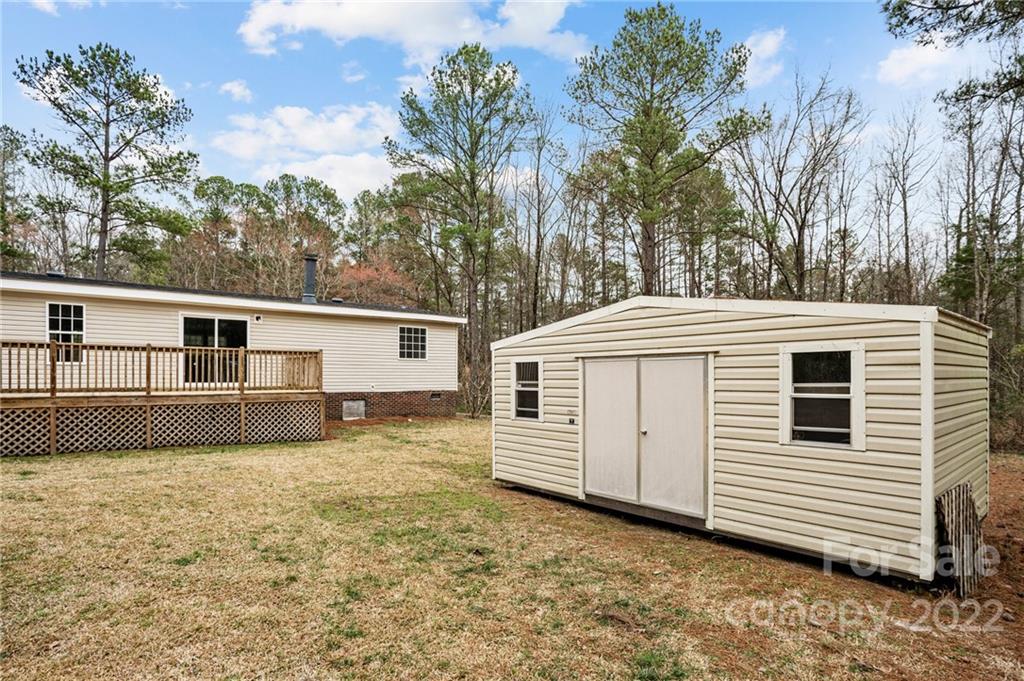 3205 Unity Church Road Lancaster, SC 29720 - Photo 30 of 45 a view of a house with a yard