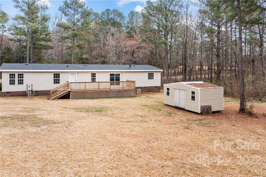 3205 Unity Church Road Lancaster, SC 29720 - Photo 38 of 45 a view of a house with a yard