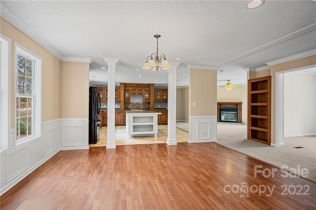 3205 Unity Church Road Lancaster, SC 29720 - Photo 6 of 45 a view of a room with wooden floor and windows