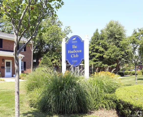 a sign board with yard