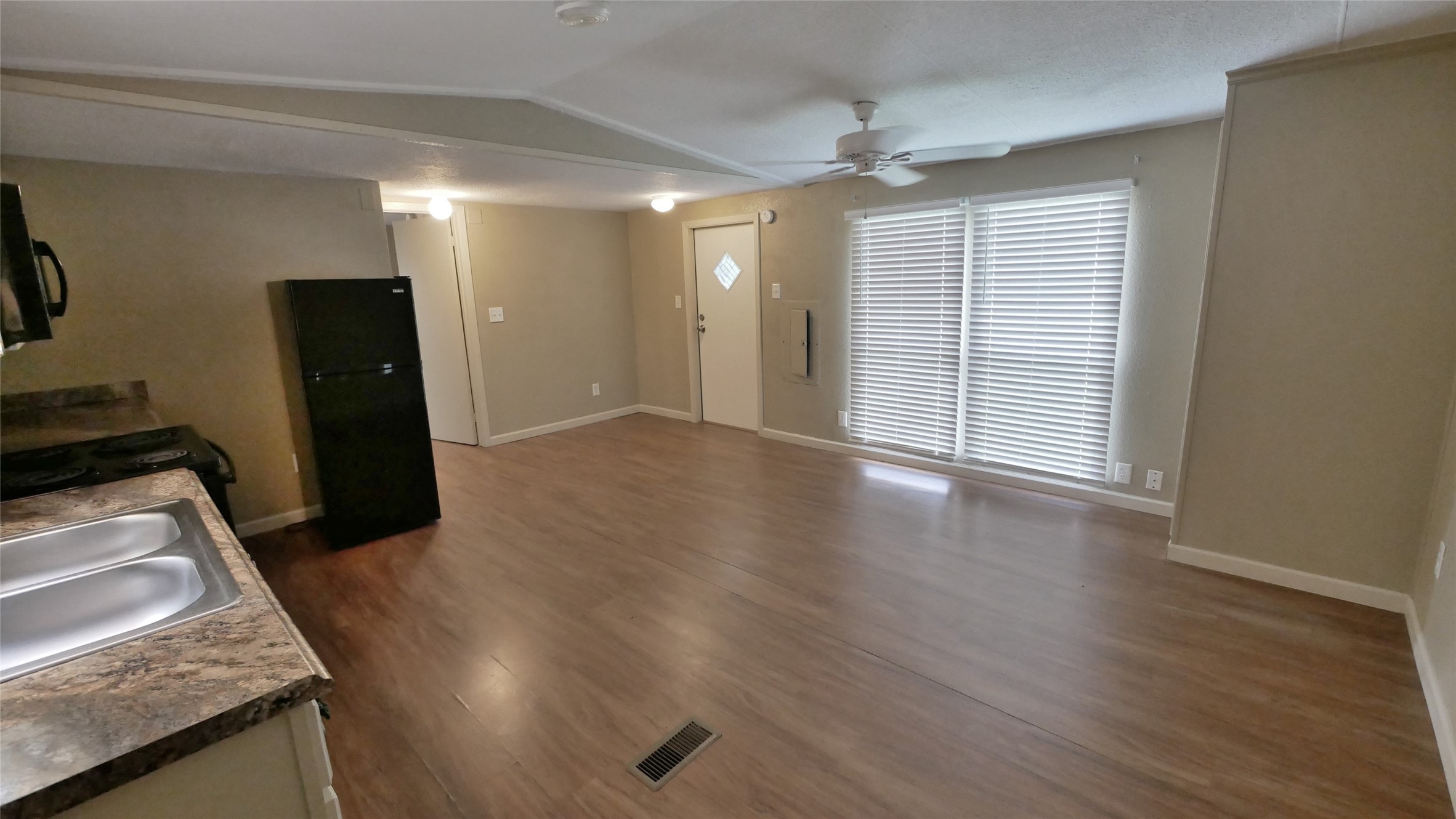 1815 Leaman Avenue, Unit 1 Rosenberg, TX 77471 - Photo 5 of 13 Entry looking into Family - Kitchen - Breakfast Rooms