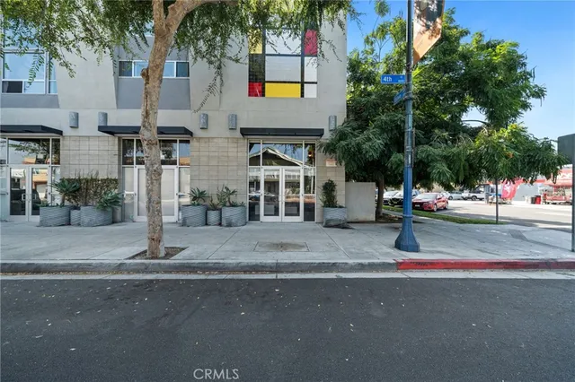 a view of street with of parked cars