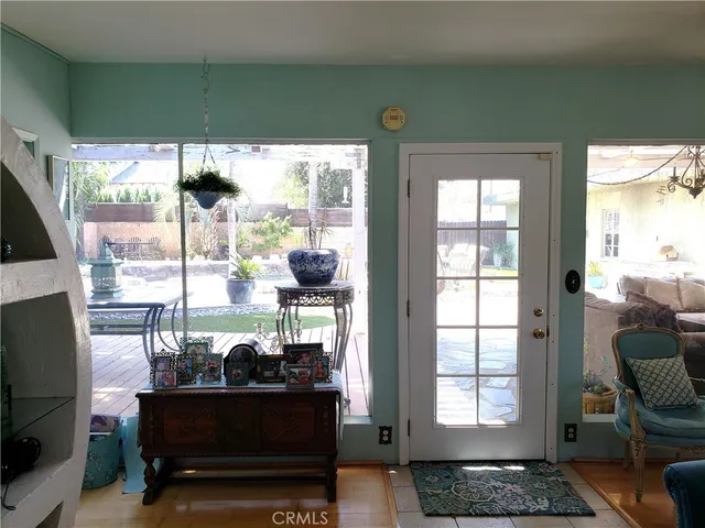 a room with furniture and a flat screen tv