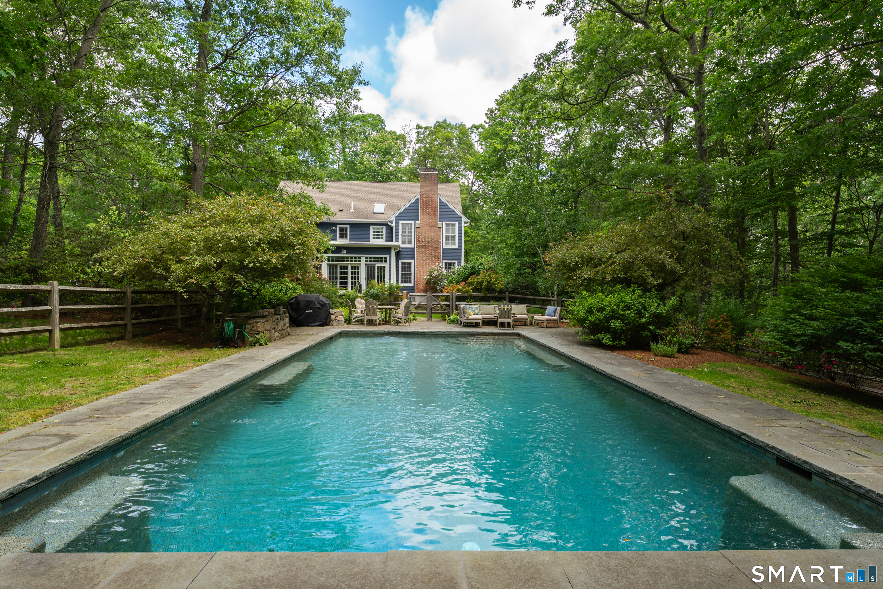 46 Laurel Cliffs Road Guilford, CT 06437 - Photo 28 of 40 This Gunite Pool has a built-in safety cover, steps into the shallow end and built-in seats on the pool edges.