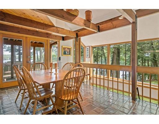 19 South Great Road Lincoln, MA 01773 - Photo 10 of 18 a view of a dining room with furniture wooden floor and windows