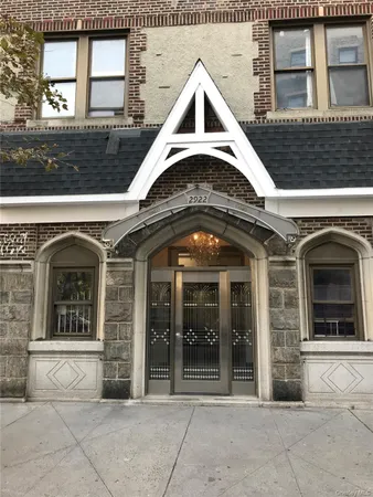 a front view of a house with a porch