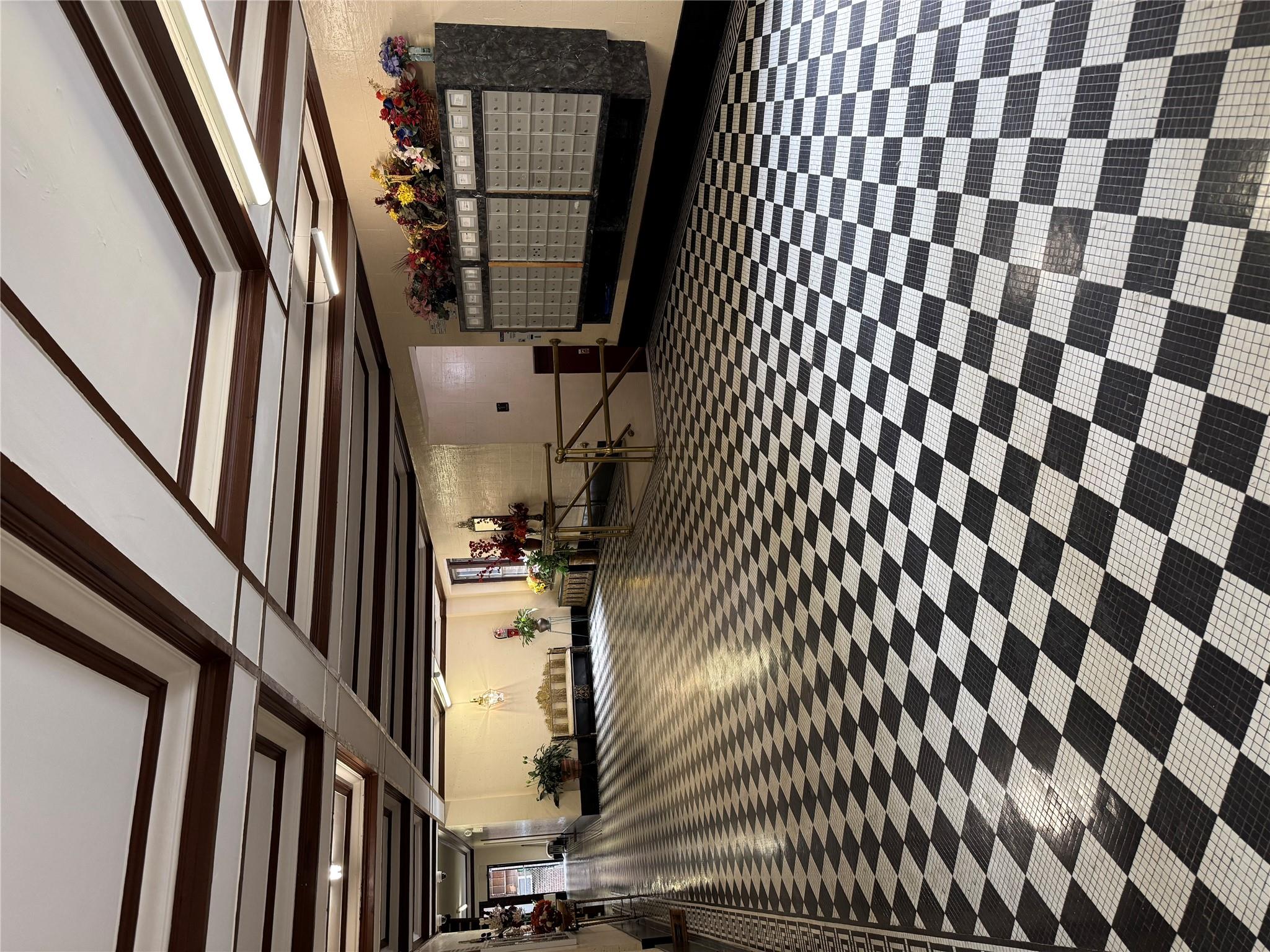 2922 Barnes Avenue, Unit 3A Bronx, NY 10467 - Photo 8 of 12 Lobby featuring coffered ceiling