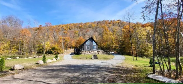 a view of swimming pool with a backyard