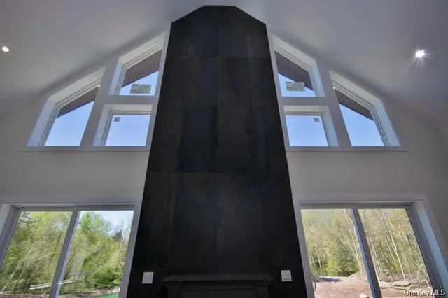 a front view of a house with a black door