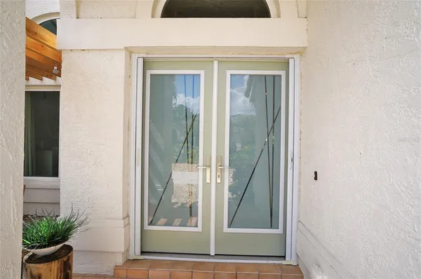a bathroom with a sink vanity and mirror