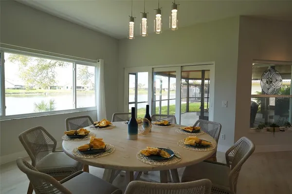an aerial view of a house with a lake view