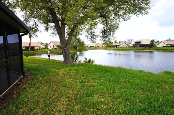 a large kitchen with lots of counter space and a sink