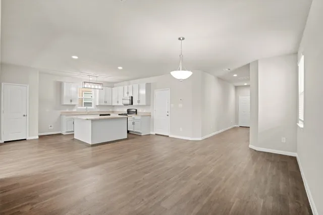 a view of kitchen with wooden floor