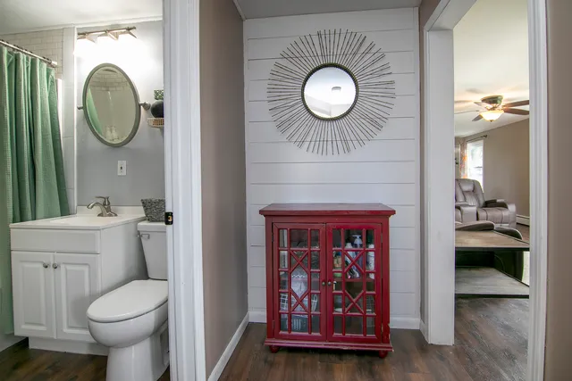 a view of bathroom with a toilet and a sink