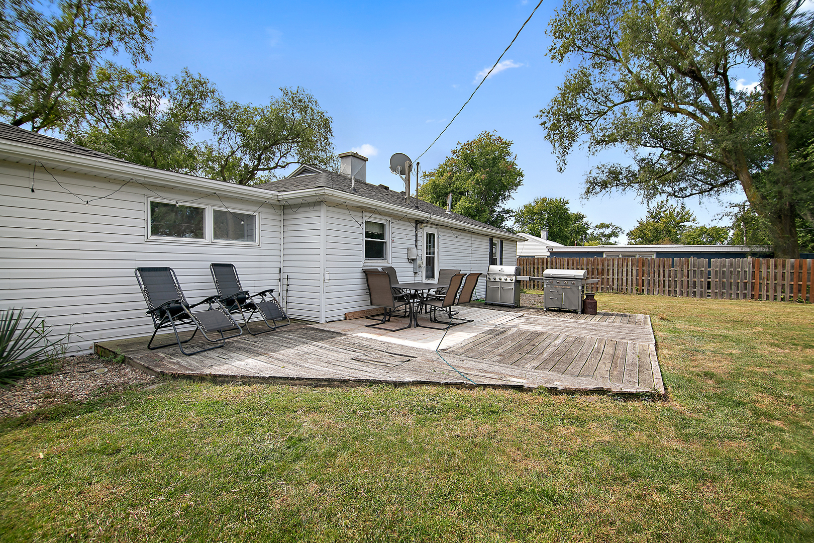 1627 West 2000S Road Kankakee, IL 60901 - Photo 25 of 30 a view of a backyard with sitting area