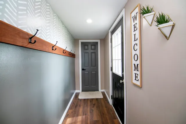 a view of a hallway to a house