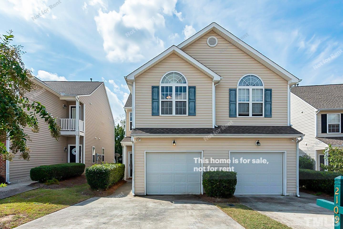 2109 Metacomet Way Raleigh, NC 27604 - Photo 1 of 17 a front view of a house with a yard