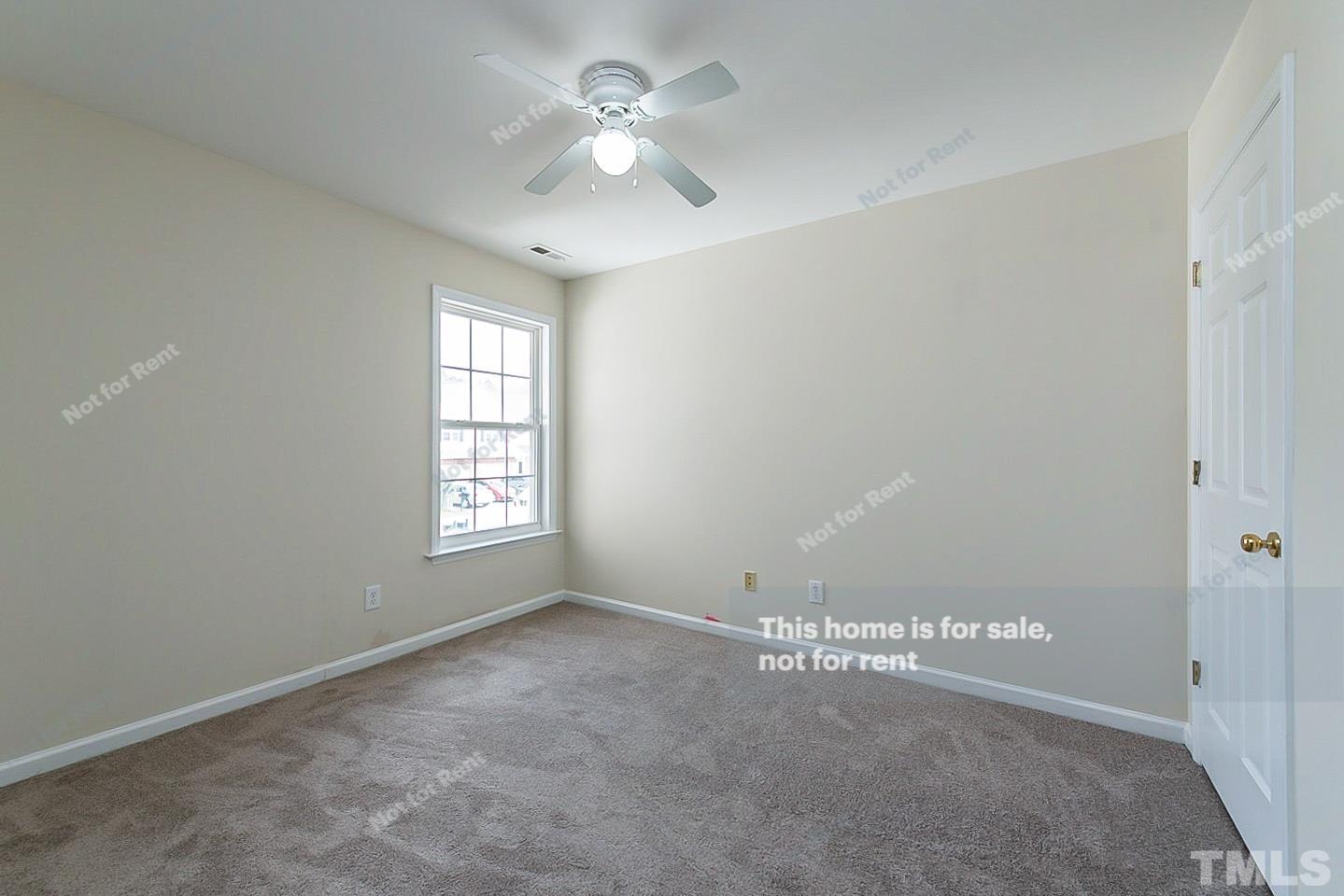 2109 Metacomet Way Raleigh, NC 27604 - Photo 12 of 17 a view of an empty room with a window