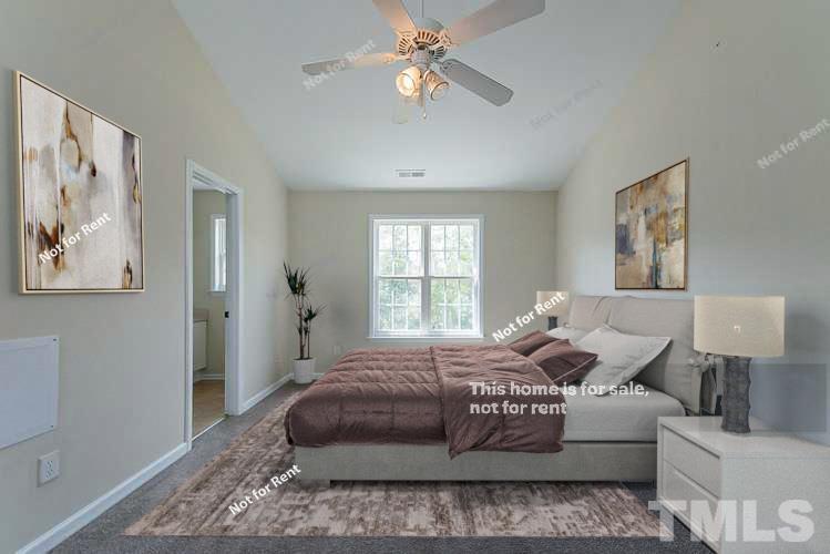 2109 Metacomet Way Raleigh, NC 27604 - Photo 8 of 17 a bedroom with a beds chandelier and a window