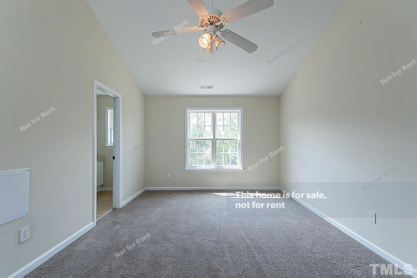 2109 Metacomet Way Raleigh, NC 27604 - Photo 9 of 17 a view of room with a ceiling fan and window