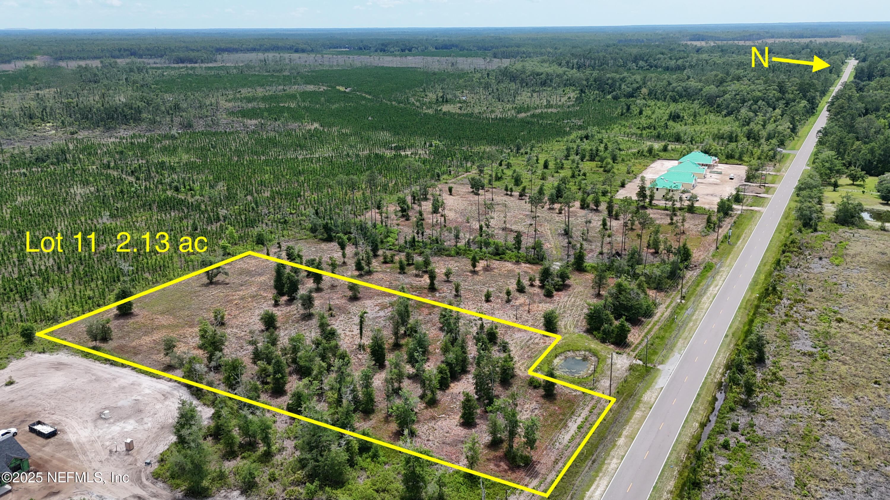 8623 Ford Road Bryceville, FL 32009 - Photo 2 of 10 a view of a tennis court