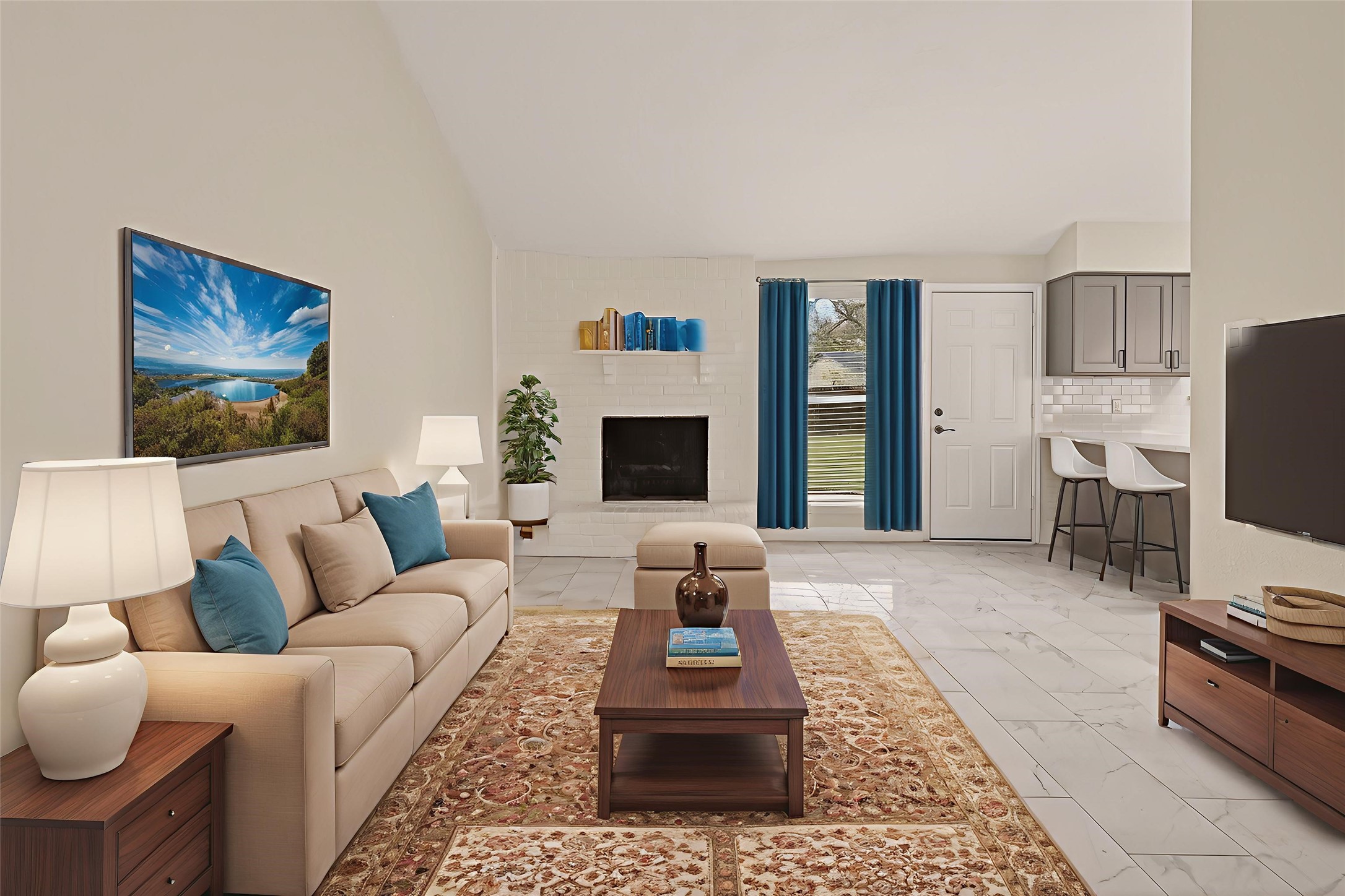 7027 Dickson Way Missouri City, TX 77489 - Photo 3 of 22 This inviting living space features a cozy fireplace, modern decor, and a neutral color palette. It includes a comfortable seating area, stylish rug, and a mounted TV. The open layout connects to a bright kitchen with bar seating, creating a welcoming atmosphere.