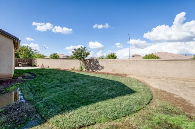 a view of a golf course with a lake